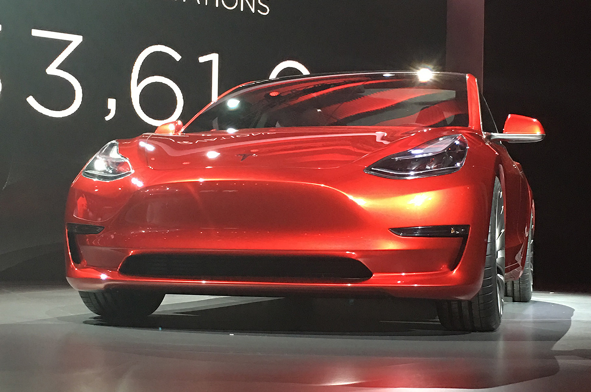 tesla-model-3-live-red-front-view